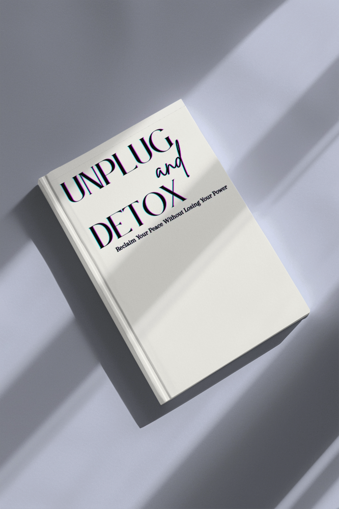 Book titled 'Unplug and Detox' on a light gray background