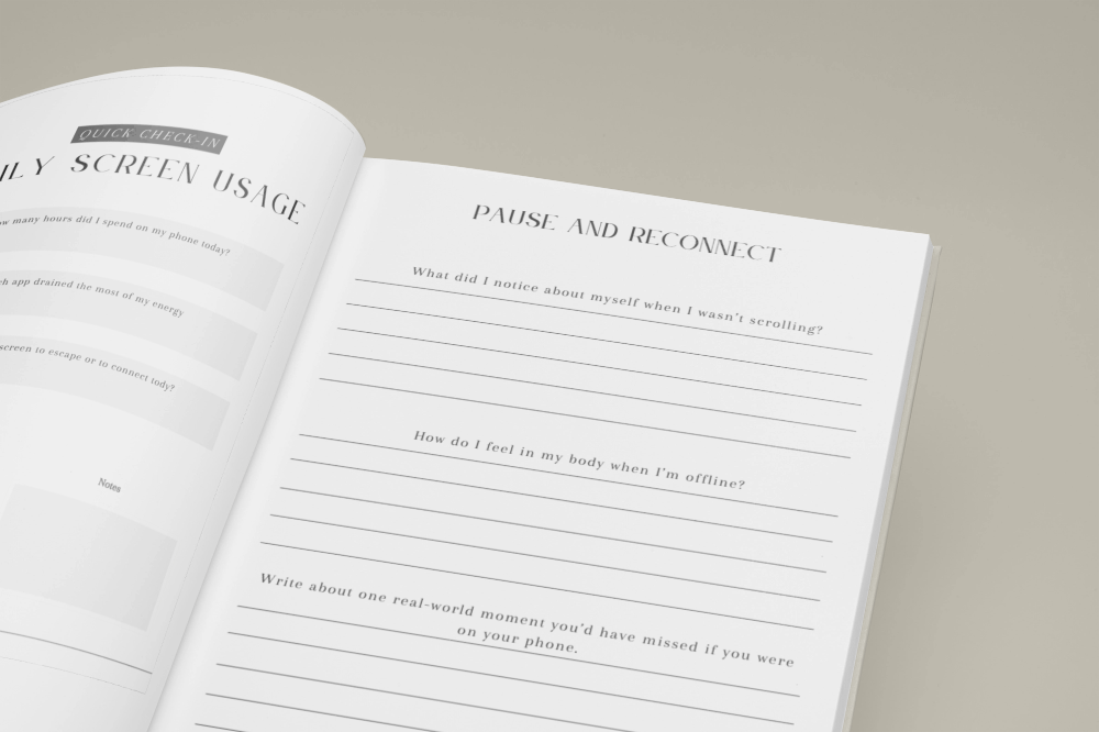 Open book with writing prompts on a neutral background